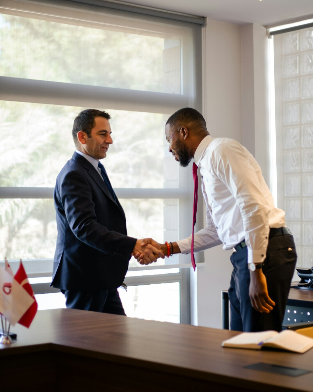 business handshake in office